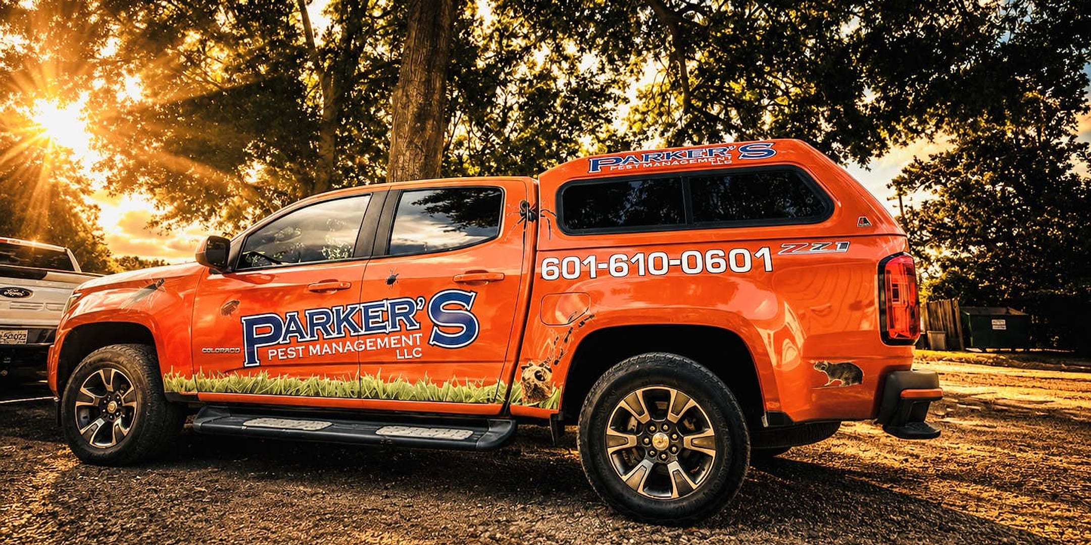 A Parker's Pest Management truck — the one that comes back on schedule