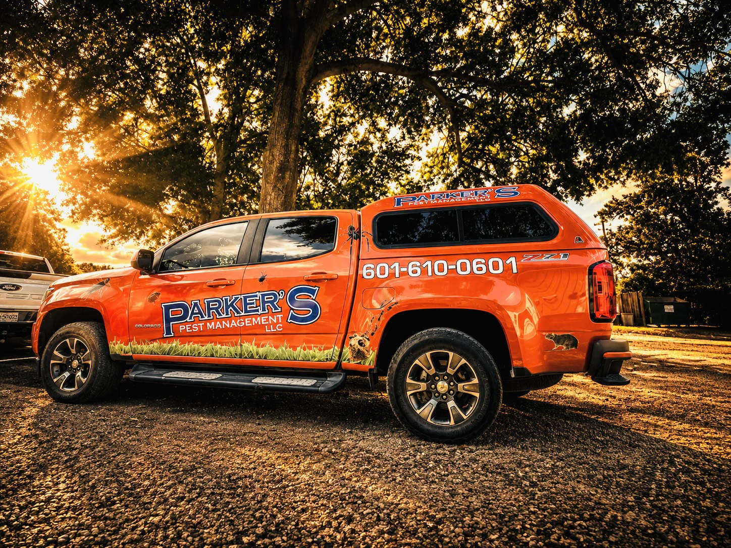 A Parker's Pest Management truck — the one that comes back on schedule