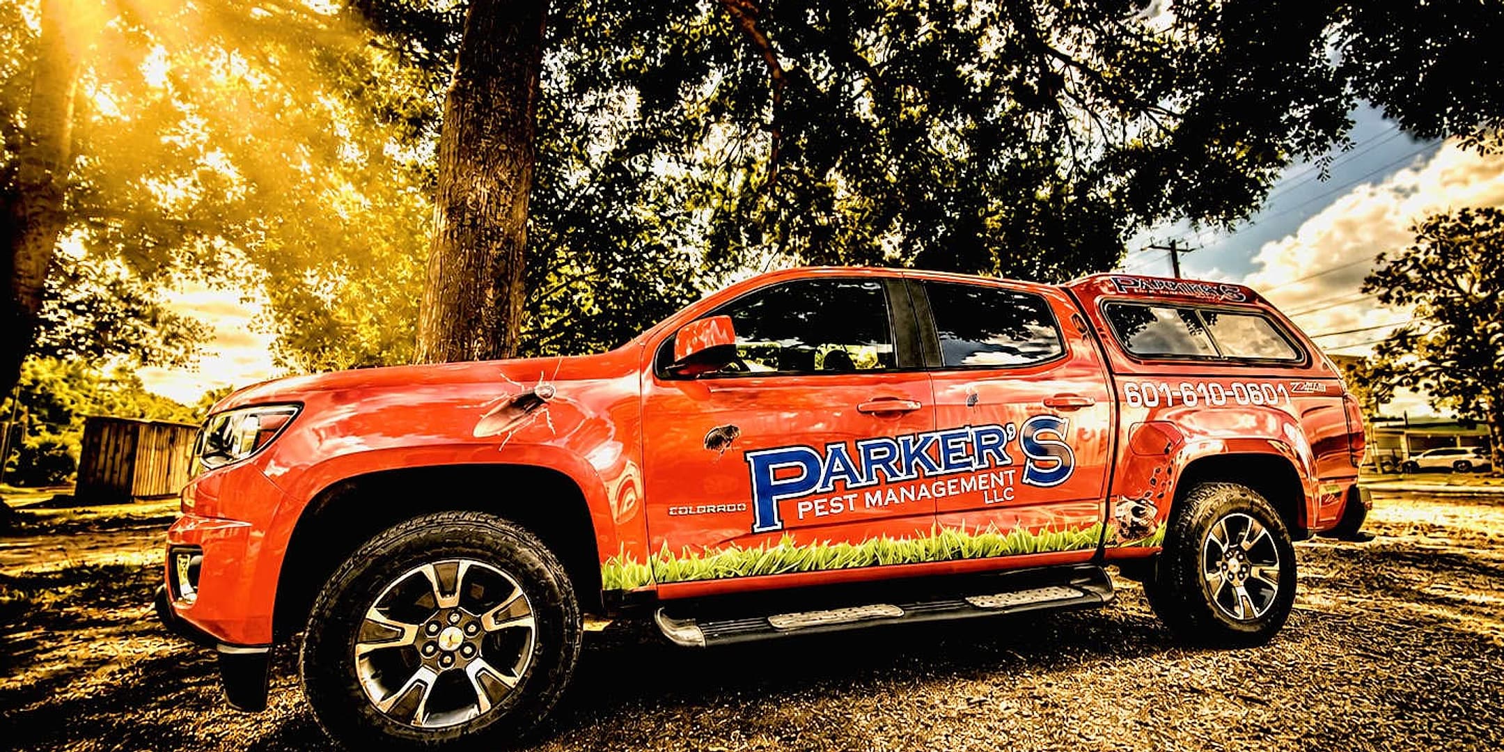 A Parker's Pest Management truck, wrapped and lettered