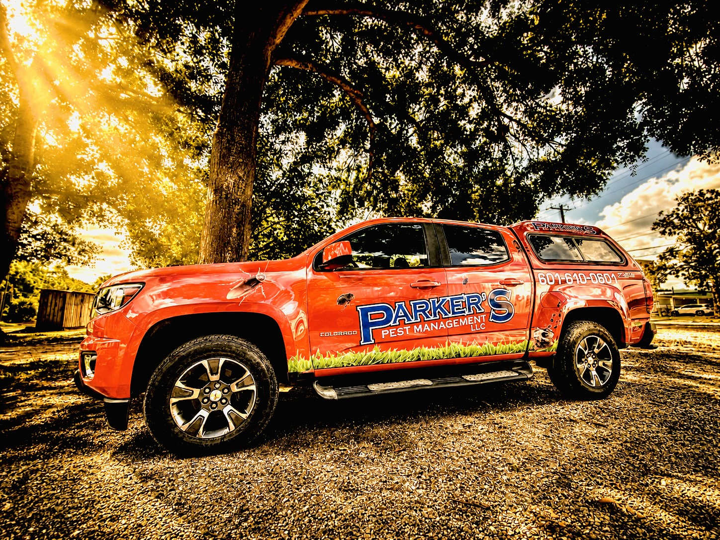 A Parker's Pest Management truck, wrapped and lettered
